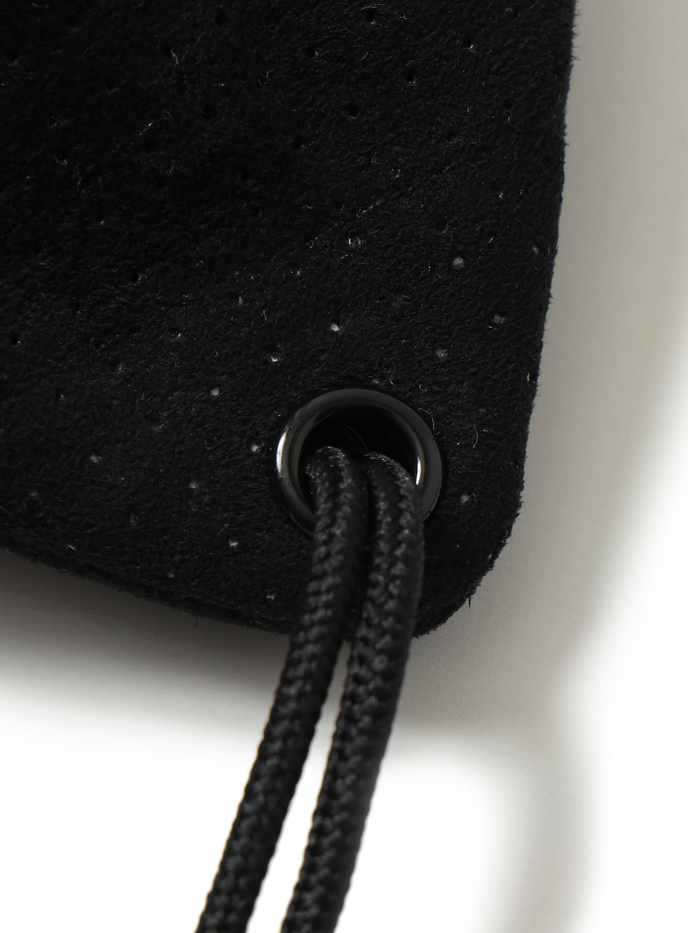 Perforated Drawstring Shoulder Bag